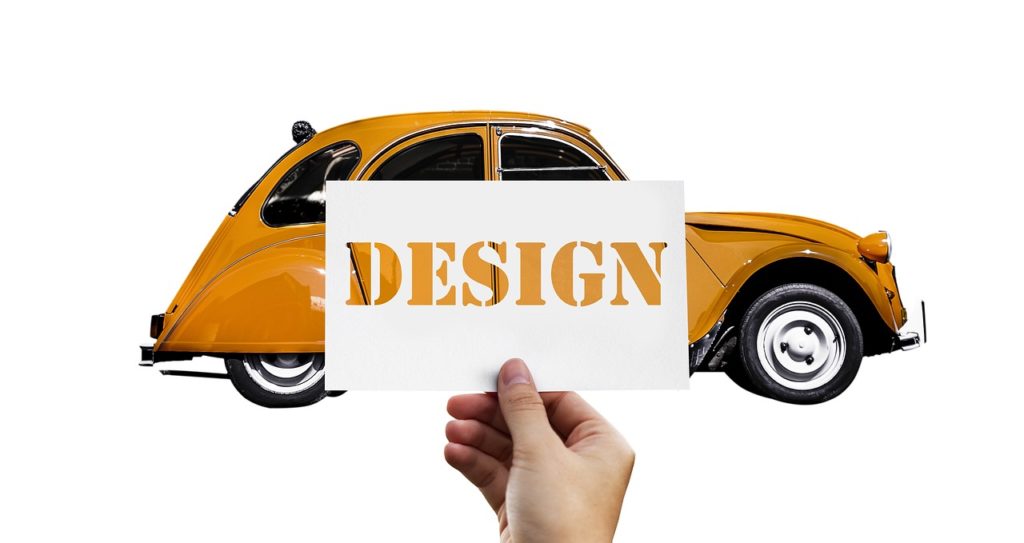 Am image of a car with the word DESIGN. Illustrating the design that goes into everything. 